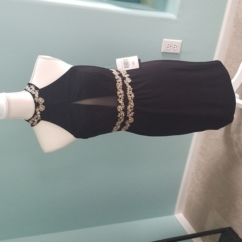 New with tags, black cocktail dress by Jodi Kristopher.